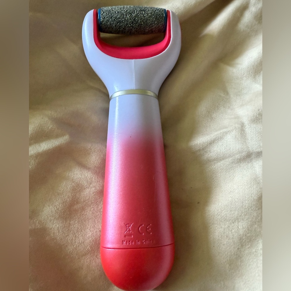 Amope Vibrant pink and purple Perfect Pedicure Skincare Exfoliant Roller